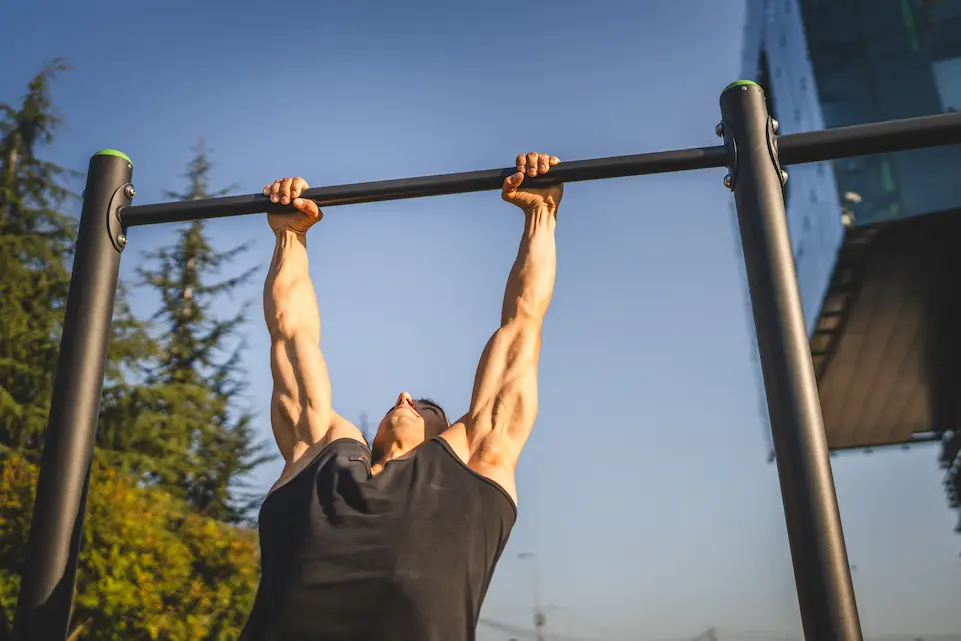 Fit man doing a pull up